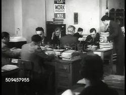 1936: U.S. THEATRE: PLAY READ: WS Men reading scripts in Federal Theatre (WPA) office. MS Men reading. WS Long table w/ scripts. CU Man stapling script. Instructional Video