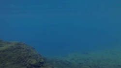 Underwater Clip Ice Lake Basin Turquoise Paradise Clear water rising out into the Alpine Mountains Stock Footage