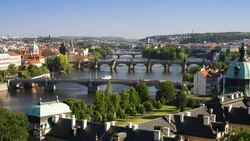 The Charles Bridge and other bridges span the River Vitava in downtown Prague. Stock Footage