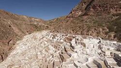 Maras salt farms (Salinas de Maras), Peru drone view Stock Footage