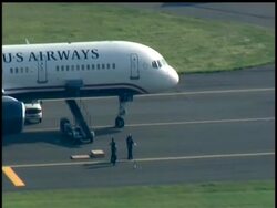 Passengers aboard a US Airways flight that arrived from Scotland were removed from the plane because of an unspecified threat Friday, and the plane was taken to another part of Philadelphia International Airport to be inspected. News Clip