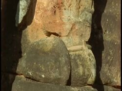 Tilt up to CU Hindu statue, Bandhavgarh National Park, India Stock Footage
