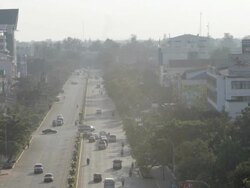 WS HA view from Patuxai Gate down boulevard / Vientiane, Laos  Stock Footage