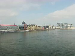 WS Cologne Cathedral with three Cranehouses and Apartments in city in front of river / Cologne, North Rhine-Westphalia, Germany Stock Footage