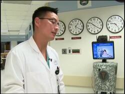 Army robot doctor takes care of patients News Clip