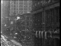 B/W 1927 tilt down confetti + ticker tape falling on parade with mounted police for Charles Lindbergh / NYC Stock Footage