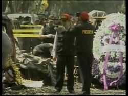 Scene of blast, wreath-laying, officials, morgue, tourists News Clip
