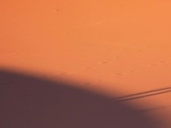 Male shadow walking across the desert sand dunes, Sahara, Morocco, Africa Stock Footage