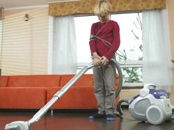 HD DOLLY: Little Boy Tangled In Vacuum Cleaner's Cable Stock Footage