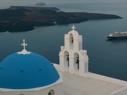 WS View of church with cruise ship moving in Ocean at Firostefani / Santorini, Cyclades, Greece Stock Footage