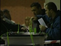 Voters queue to cast ballot before polls close Instructional Video