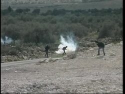 Troops fire gas grenades at protesters at site of barrier News Clip