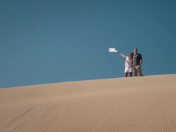 Couple in desert Stock Footage