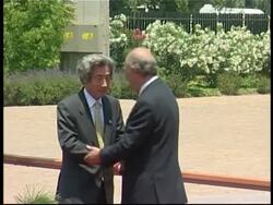 Summit arrivals and round table, comments News Clip