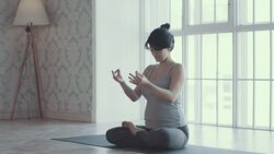 Two women doing yoga meditation and stretching exercises Stock Footage