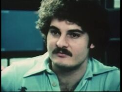 A technician looks at a coronary angiogram on a heart monitor. News Clip