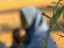 Woman and children at refugee camp Stock Footage