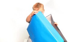 Boy opens gift Stock Footage