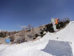 Snowboarding Backside 180 Stock Footage