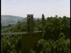 Clifton Suspension Bridge, Bristol - MS pan across 245 feet high bridge over river Avon Stock Footage