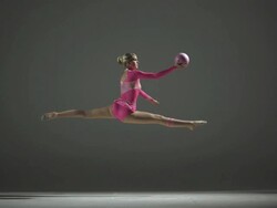 HD Super Slow-Mo: Rhythmic Gymnastics With A Ball Stock Footage