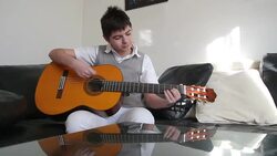 Teenager playing guitar Stock Footage