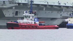 HMS Queen Elizabeth, the Royal Navy's new aircraft carrier, leaves dock to begin sea trials News Clip