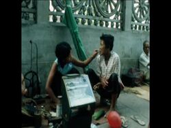 SYND 11 08 74 KHMER STREET DENTISTS AT WORK News Clip