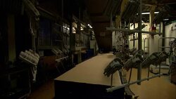 Sausage-making equipment moves on hooks above the operations floor. Stock Footage