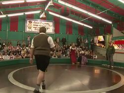 Game "Teufelsrad" and audience watching boxing people Stock Footage