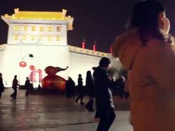 POV Women performing dance in square of ancient city wall/xian,shaanxi,china Stock Footage