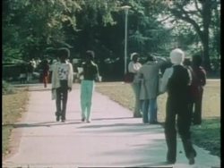 Students walk on a sidewalk at Tuskegee University. News Clip