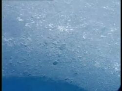 CU Underwater shot of melting, glistening ice, Antarctica Stock Footage