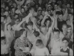 A crowd of teenagers cheer and wave holding a newspaper stating Dillinger Slain!' News Clip
