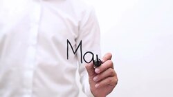 Hand Writing 'Marketing' Stock Footage