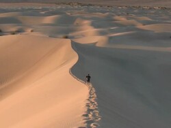 HD: Running on a sand dune Stock Footage