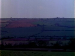 T/L landscape, cloud shadows over fields, lapse time/locked shot, Over Norton Stock Footage