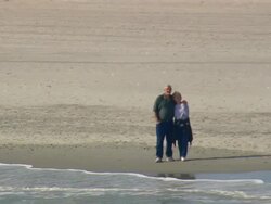 MS AERIAL TS Shot of couple enjoying on myrtle beach / South Carolina, United States Stock Footage