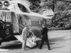 President John F. Kennedy getting into helicopter Stock Footage