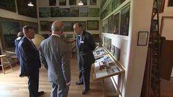 Prince Charles inspecting paintings at Chartwell News Clip