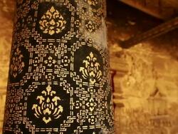 CU PAN Shot of temple black and gold columns with golden wall / Luang Prabang, Laos Stock Footage