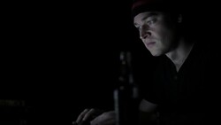 Displeased man working on computer in the dark Stock Footage