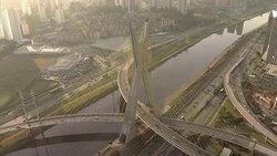 Traffic travels over a modern suspension bridge. Stock Footage