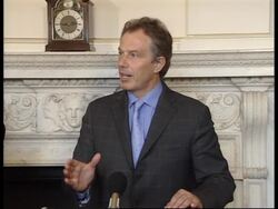 PM with Berlusconi, immigration comments News Clip