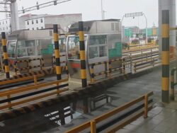 WS View from window of moving car past toll station of Expressway/hancheng,shaanxi,China Stock Footage