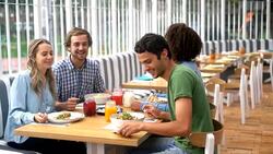 Friends taking a selfie at a restaurant Stock Footage