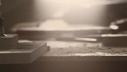 Wooden plank falling down on table in workshop Stock Footage