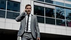 SLO MO Yuppie on the cell phone Stock Footage