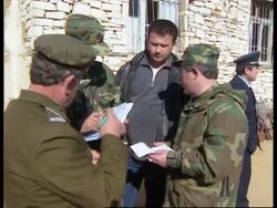 ALBANIA: UN AMNESTY ON LOOTED WEAPONS News Clip