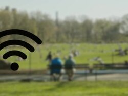 Wifi hotspot wireless technology in Central park Stock Footage